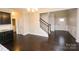 Open layout with a staircase in view, connecting the kitchen and entrance area at 1333 Rainier Dr, Fort Mill, SC 29708