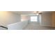 This spacious loft area features carpet flooring, a ceiling fan, and great natural light at 1333 Rainier Dr, Fort Mill, SC 29708