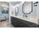 Bathroom featuring double vanity, mirrors and modern fixtures and hardware at 14013 Pinoli Pine Cir, Huntersville, NC 28078