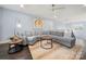 Cozy upstairs living area with plush sectional sofa and stylish decor at 14013 Pinoli Pine Cir, Huntersville, NC 28078
