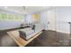 Upstairs living room with hardwood floors and abundant natural light at 14013 Pinoli Pine Cir, Huntersville, NC 28078