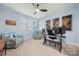 Spacious office with comfortable chairs, desk and natural light at 14013 Pinoli Pine Cir, Huntersville, NC 28078