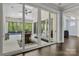 Screened patio with ceiling fan and a beautiful view of the swimming pool at 14013 Pinoli Pine Cir, Huntersville, NC 28078