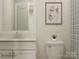 Bathroom featuring a white vanity, toilet, decorative art, and modern fixtures at 1512 Croydon St, Indian Land, SC 29707