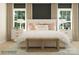 This bedroom features bright natural light, stylish decor, and a comfortable layout at 1512 Croydon St, Indian Land, SC 29707