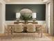 Chic dining room featuring a sleek buffet, a round mirror, and sophisticated lighting at 1512 Croydon St, Indian Land, SC 29707