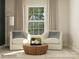 A charming sitting area with plush chairs and a modern coffee table at 1512 Croydon St, Indian Land, SC 29707