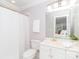 Clean, white bathroom with shower and tub combination, complete with modern fixtures at 1700 White Pond Ln, Waxhaw, NC 28173