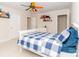 Cozy bedroom featuring a blue and white comforter with two closets at 1700 White Pond Ln, Waxhaw, NC 28173