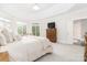 Bright bedroom with bay window, neutral carpet, and tray ceiling for a peaceful retreat at 1700 White Pond Ln, Waxhaw, NC 28173