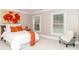 Cozy bedroom featuring bright natural light, with warm colors and artistic accents at 1700 White Pond Ln, Waxhaw, NC 28173