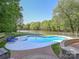 A beautiful in-ground pool with a lake view at 1700 White Pond Ln, Waxhaw, NC 28173