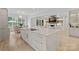 Open-concept kitchen with an island and view into living room; features modern appliances and stylish design at 1717 Brawley School Rd, Mooresville, NC 28117