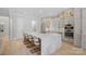 Spacious kitchen with a large island, stainless steel appliances, and custom cabinetry, perfect for cooking and gathering at 1717 Brawley School Rd, Mooresville, NC 28117