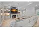 Inviting living room features a fireplace, TV, and comfortable seating with great natural light at 1717 Brawley School Rd, Mooresville, NC 28117