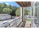 View from balcony overlooking parking area and lush green trees in a beautiful and quiet area at 18832 Nautical Dr # 41, Cornelius, NC 28031