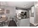 Modern kitchen with stainless appliances, dark countertops, and open layout to dining area at 18832 Nautical Dr # 41, Cornelius, NC 28031