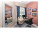 This office features a desk, office chair, and window with curtains at 18832 Nautical Dr # 41, Cornelius, NC 28031