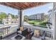 Enjoy the scenic view of the pool and landscaped grounds from this relaxing outdoor patio at 18832 Nautical Dr # 41, Cornelius, NC 28031