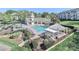 Aerial view of the community pool area, surrounded by lush greenery and comfortable lounge seating at 18832 Nautical Dr # 41, Cornelius, NC 28031