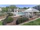 Community pool featuring a gazebo and lounge chairs with a manicured landscape at 18832 Nautical Dr # 41, Cornelius, NC 28031