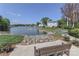 A waterfront scene featuring a lake and comfortable bench seating to enjoy the scenic vista at 18832 Nautical Dr # 41, Cornelius, NC 28031