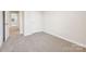Bedroom featuring plush carpeting and neutral paint at 1930 Old Rivers Rd, Concord, NC 28027
