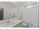 Bright and clean bathroom with a shower and a modern vanity at 2137 Foxcroft Woods Ln, Charlotte, NC 28211