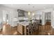 Beautiful kitchen featuring a large center island with seating and top-of-the-line stainless steel appliances at 2137 Foxcroft Woods Ln, Charlotte, NC 28211