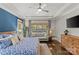 Relaxing bedroom with tray ceiling and oversized windows offering outdoor views; a serene retreat at 2137 Foxcroft Woods Ln, Charlotte, NC 28211