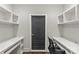 Clean and organized office area with built-in shelves and two separate desk spaces at 2137 Foxcroft Woods Ln, Charlotte, NC 28211