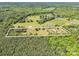 Aerial view of large wooded lot with approximate property lines in a rural area at 2251 Old Applewood Ln # 9, Iron Station, NC 28080