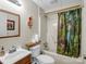 Bathroom featuring a sink, toilet, shower, and decorative elements at 2251 Old Applewood Ln # 9, Iron Station, NC 28080