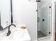 Modern bathroom showcasing a sleek vanity and a glass-enclosed shower with black accents at 2302 Jordi Way, Charlotte, NC 28213