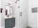 Elegant bathroom featuring a glass-enclosed shower with marble tile and stylish vanity at 2302 Jordi Way, Charlotte, NC 28213