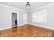 Bedroom with hardwood floors, and an ensuite bath and plenty of natural light at 2302 Jordi Way, Charlotte, NC 28213