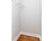 A small closet with hardwood floors, white walls, and wire shelving at 2302 Jordi Way, Charlotte, NC 28213