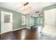 View of the dining area with a modern light fixture and hardwood floors at 248 Pangle Dr, Charlotte, NC 28217