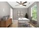 A modern office space includes a desk, chair, and natural light from a window at 248 Pangle Dr, Charlotte, NC 28217