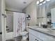 Clean bathroom featuring a shower-tub combo with a modern vanity and granite countertops at 252 S Potter Rd, Lancaster, SC 29720
