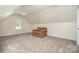 Bedroom with carpet, a window, and an accent chair at 2586 Lee Lawing Rd, Lincolnton, NC 28092