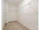 Walk-in closet includes wire shelving and neutral carpet at 2586 Lee Lawing Rd, Lincolnton, NC 28092