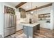 Modern kitchen with stainless appliances, gray island, and stylish shelving at 2586 Lee Lawing Rd, Lincolnton, NC 28092