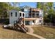 Beautiful exterior view of the home showcasing its modern design and outdoor living spaces at 264 Fairway Shores Rd, Mount Gilead, NC 27306