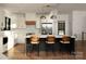 Stylish kitchen features a large island with seating, stainless steel appliances, and ample storage space at 264 Fairway Shores Rd, Mount Gilead, NC 27306