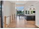 Open-concept living space with a lake view, dining area, and modern finishes provides an inviting atmosphere at 264 Fairway Shores Rd, Mount Gilead, NC 27306