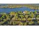 An aerial view of stunning lakefront properties surrounded by lush greenery at 300 Yacht Rd, Mooresville, NC 28117