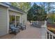 Outdoor deck with comfortable seating and lounge chairs offer a relaxing space to enjoy the scenic views at 300 Yacht Rd, Mooresville, NC 28117