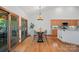 Bright dining area featuring hardwood floors, a chandelier, and sliding doors to the outdoor space at 300 Yacht Rd, Mooresville, NC 28117