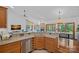 Open kitchen features granite countertops, stainless appliances, a dining area, and access to a deck at 300 Yacht Rd, Mooresville, NC 28117